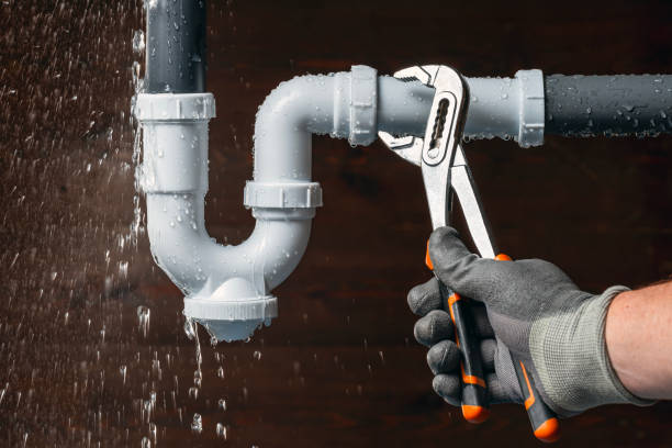 Professional Emergency Plumber technician working in Whitehall, PA